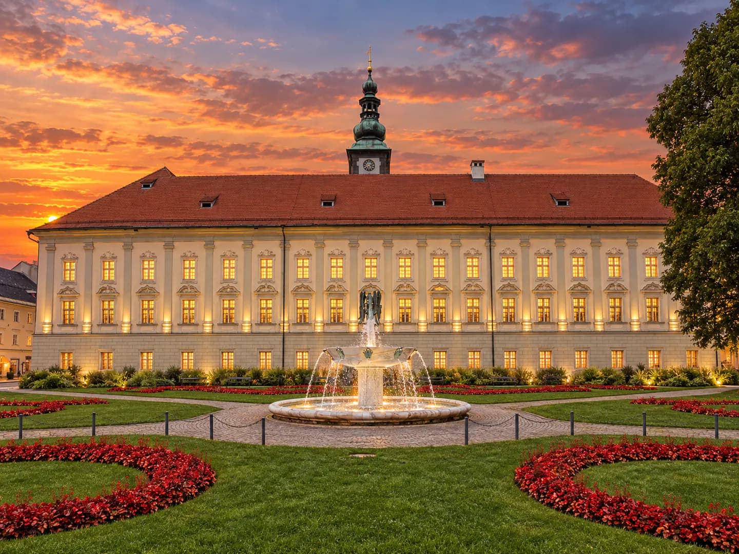 Bürgerschutz Verein in Klagenfurt am Wörthersee – unabhängige Bürgerarbeit KI-generierte Stadtvisualisierung mit historischer Architektur, Brunnen und Abendhimmel in Klagenfurt am Wörthersee